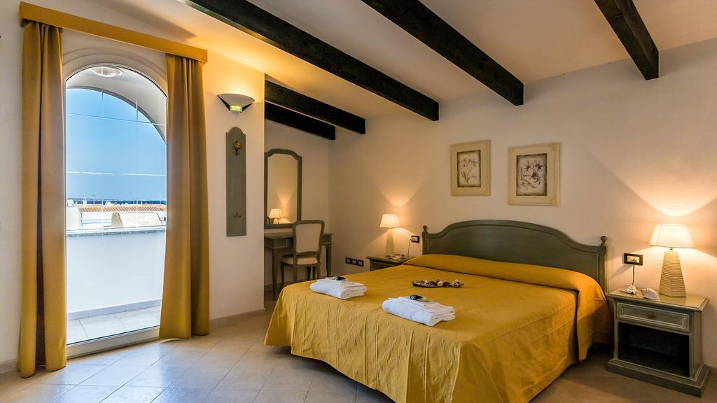 Hotel Cala Di Seta Calasetta Habitación foto